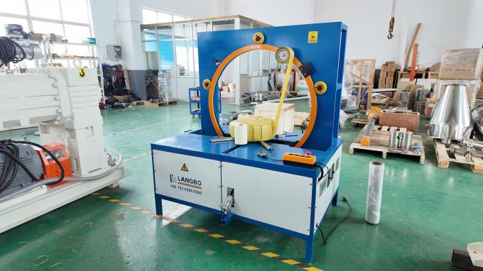 Soft flexible HDPE PP corrugated pipe wrapping machine — full view of the coil packing unit